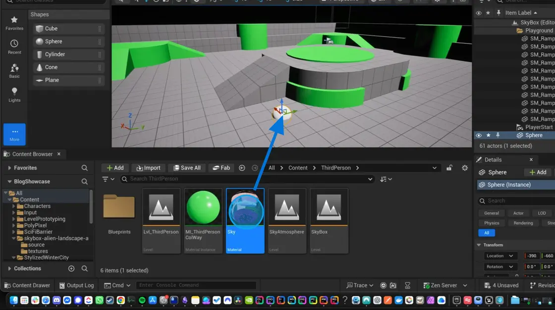 Blue arrow showing how to drag and drop Sky material onto sphere